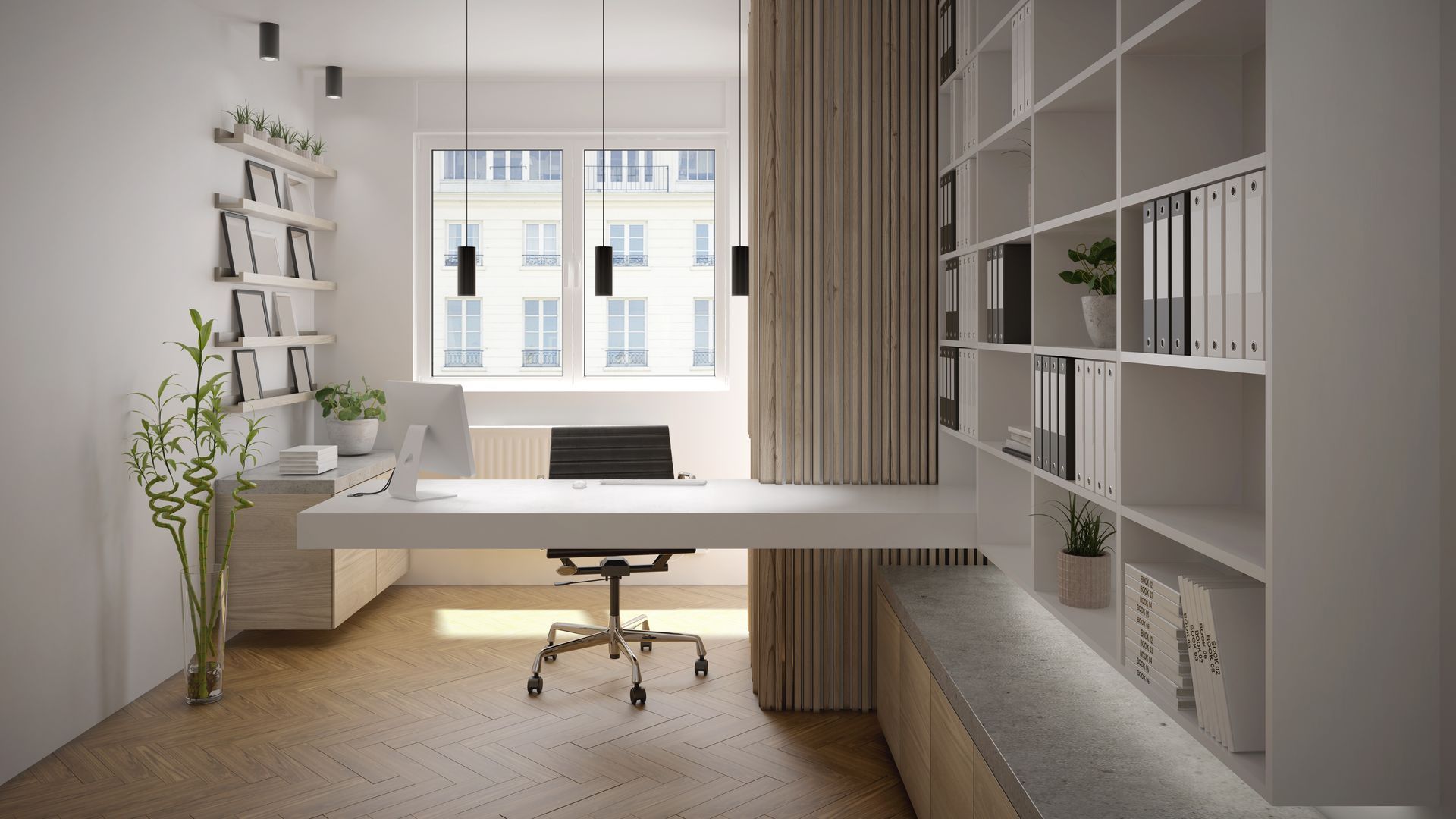 A modern home office with a desk , chair , bookshelf and window.
