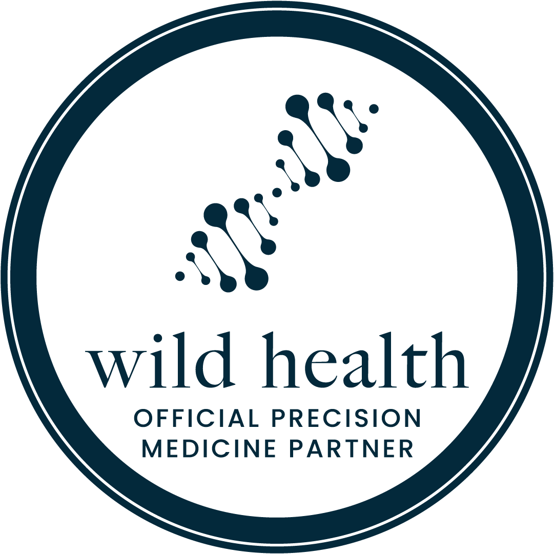 A logo for wild health , an official precision medicine partner.