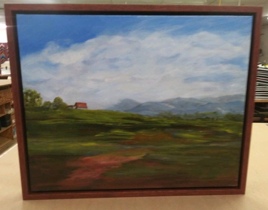 framed painting of landscape