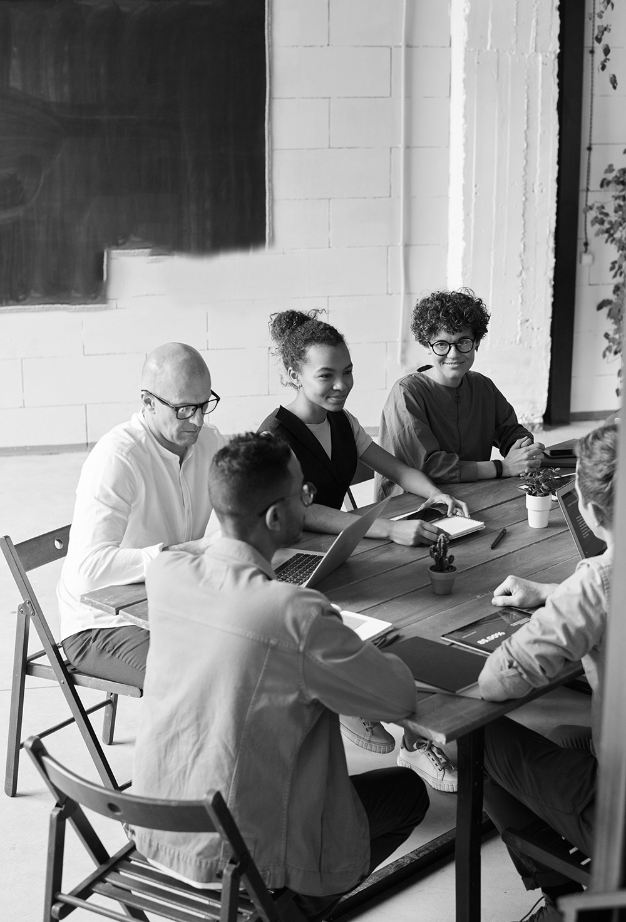 Small gathering of men and women learning to become mentors.