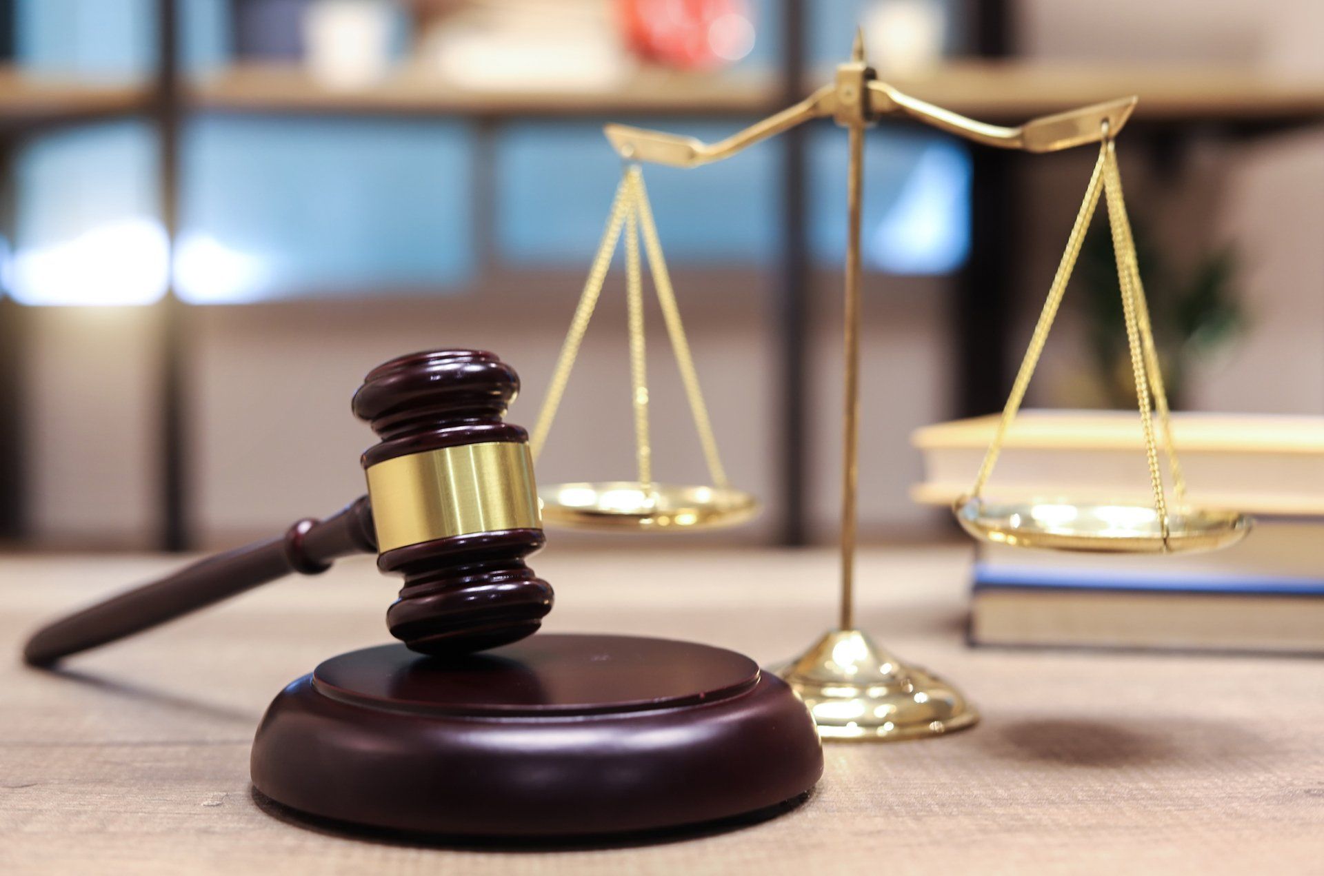Justice Scales, Books and Wooden Gavel — St. Augustine, FL — Law Office Of Christina J. Opsahl, LLC Justice Scales, Books and Wooden Gavel — St. Augustine, FL — Law Office Of Christina J. Opsahl, LLC