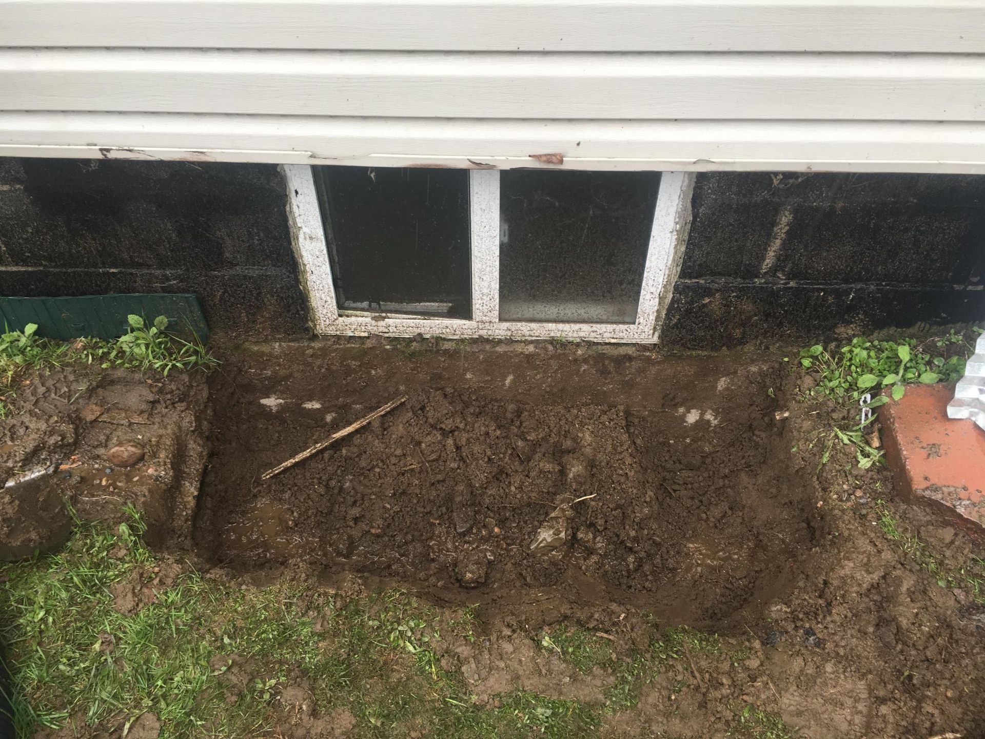 Exterior Window Well Installation