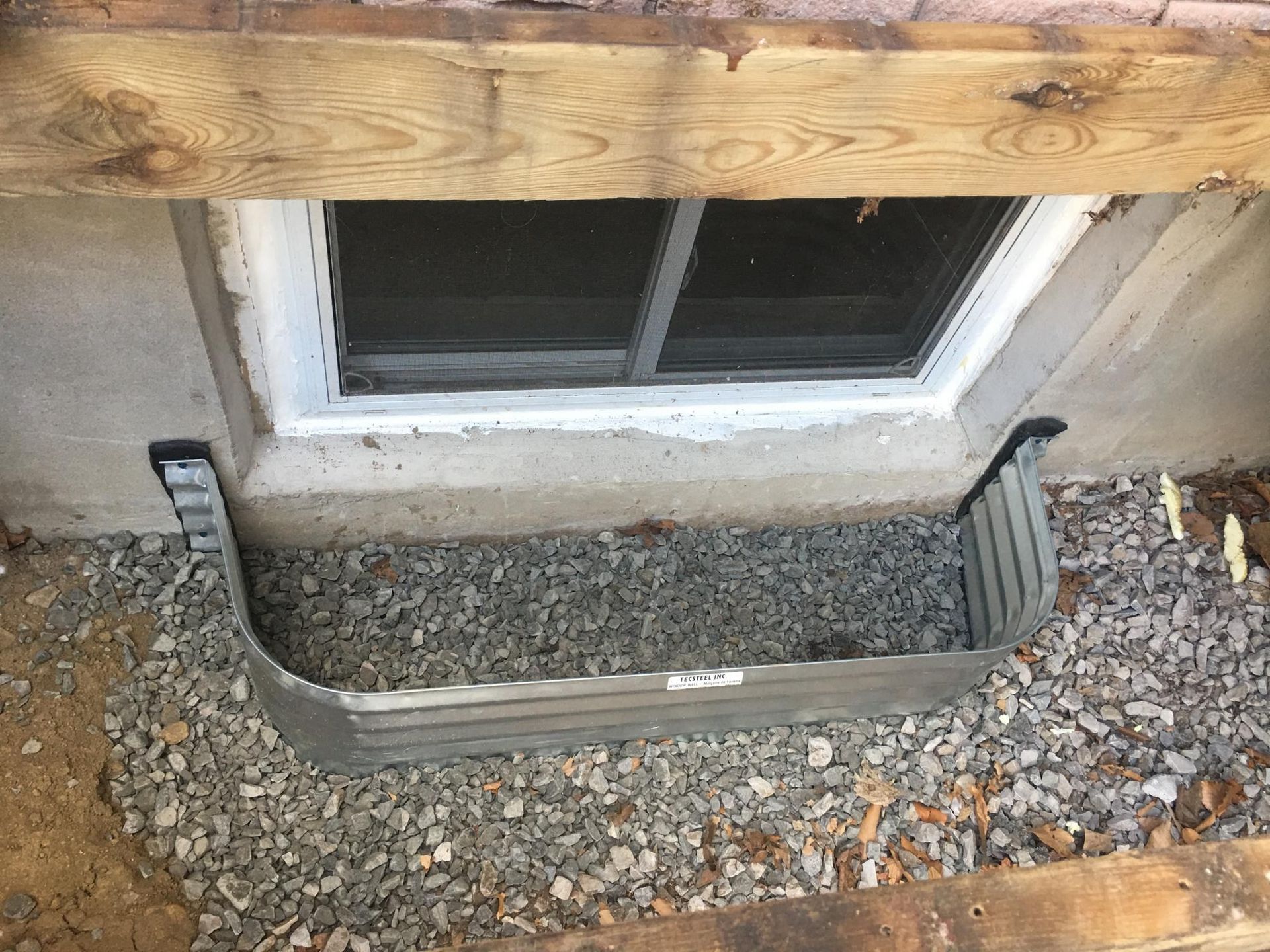Exterior Window Well Installation for Basement Windows