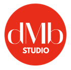 Red circle with "dMb" in white lettering above "STUDIO".