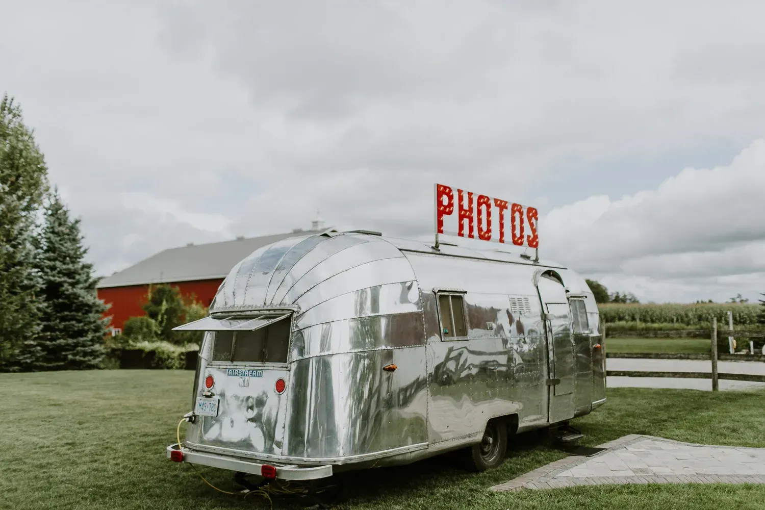Shiny silver photo booth trailer with