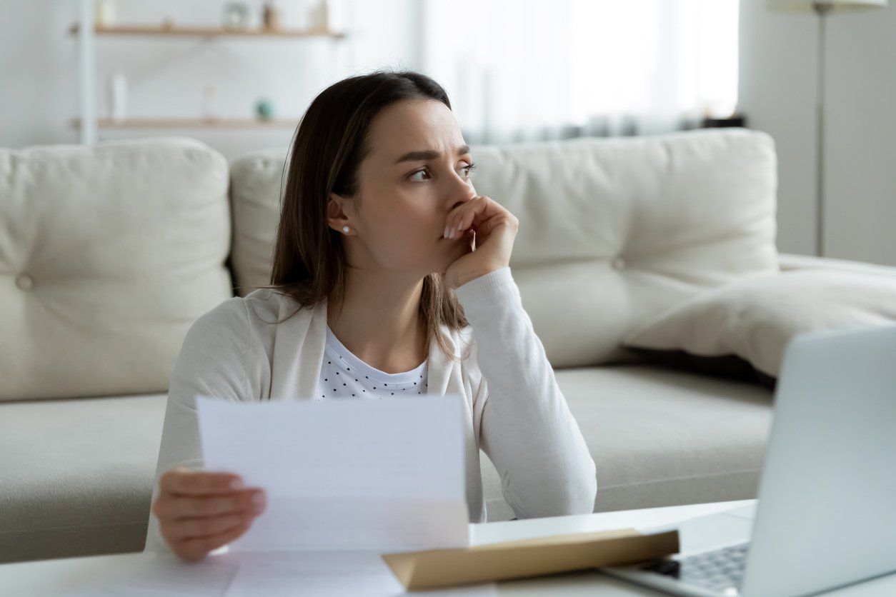 Person Anxious About Credit Card Debt in Laredo, TX