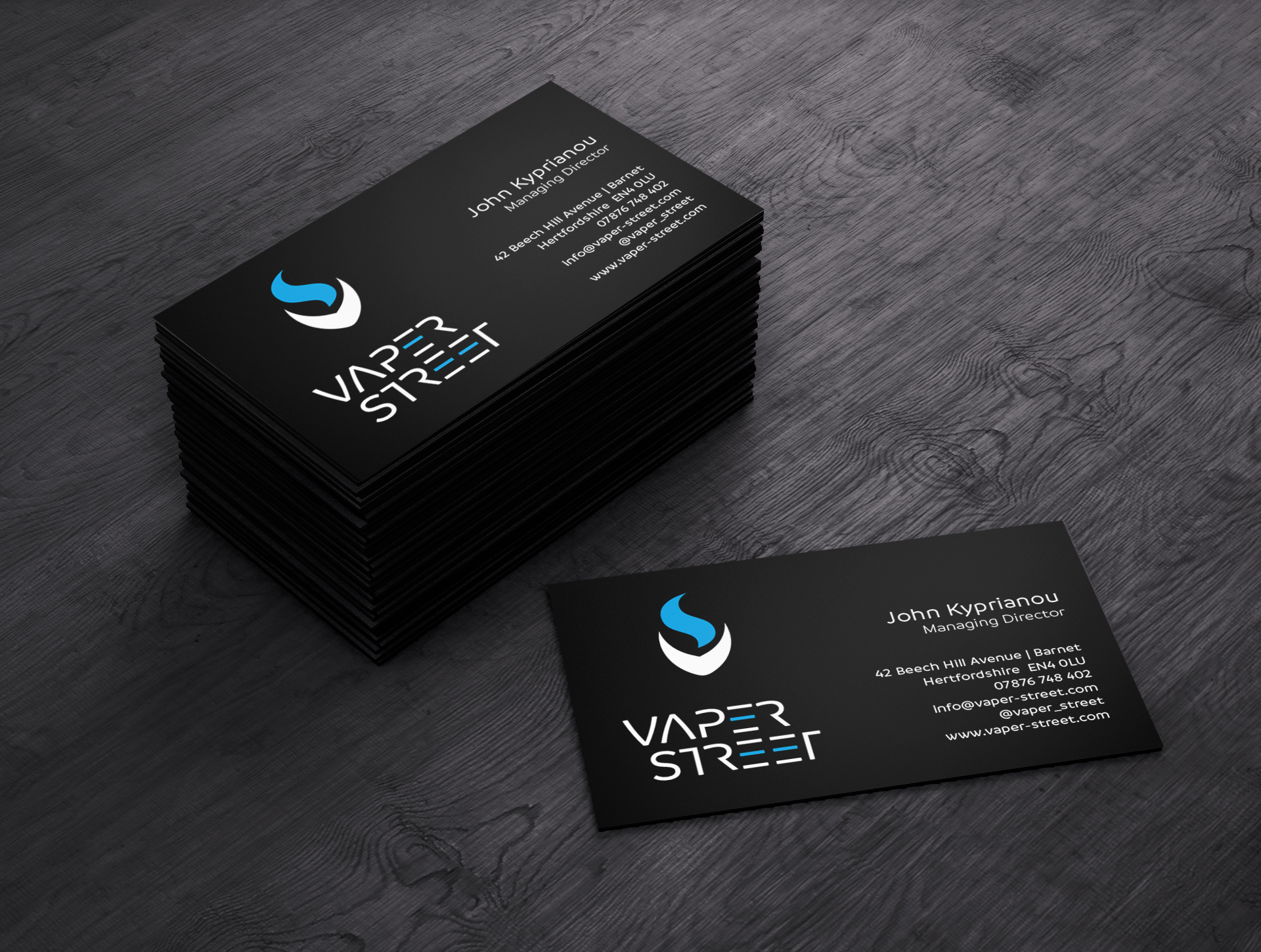 Vaper Street branded business cards on table