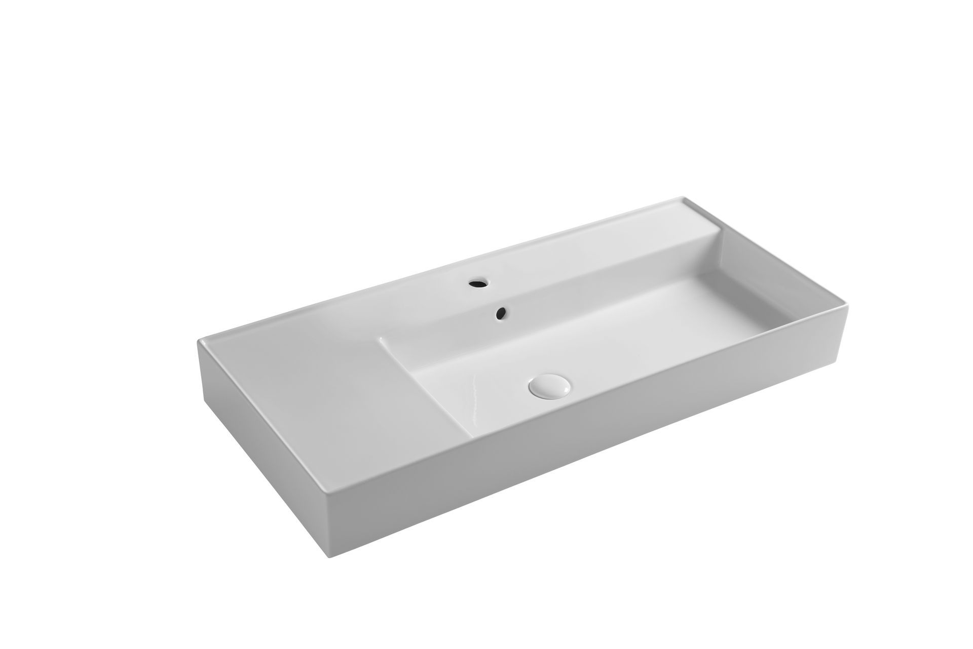Lavandino rettangolare bianco per il bagno con piano d'appoggio integrato.