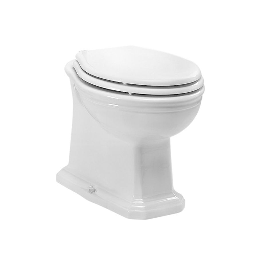 Un WC a pavimento in ceramica bianca, in stile vintage, con coperchio abbinato.