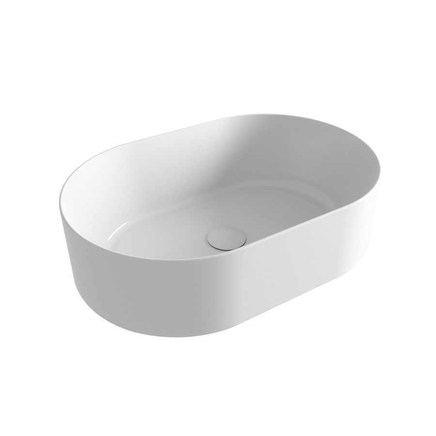 Lavandino da bagno bianco di forma ovale con base arrotondata, visto da un angolo.