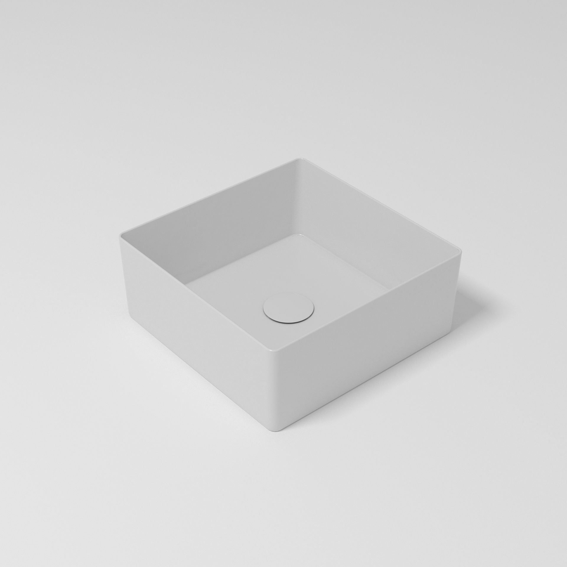 Lavandino da bagno quadrato in ceramica bianca con scarico centrale, su sfondo bianco.