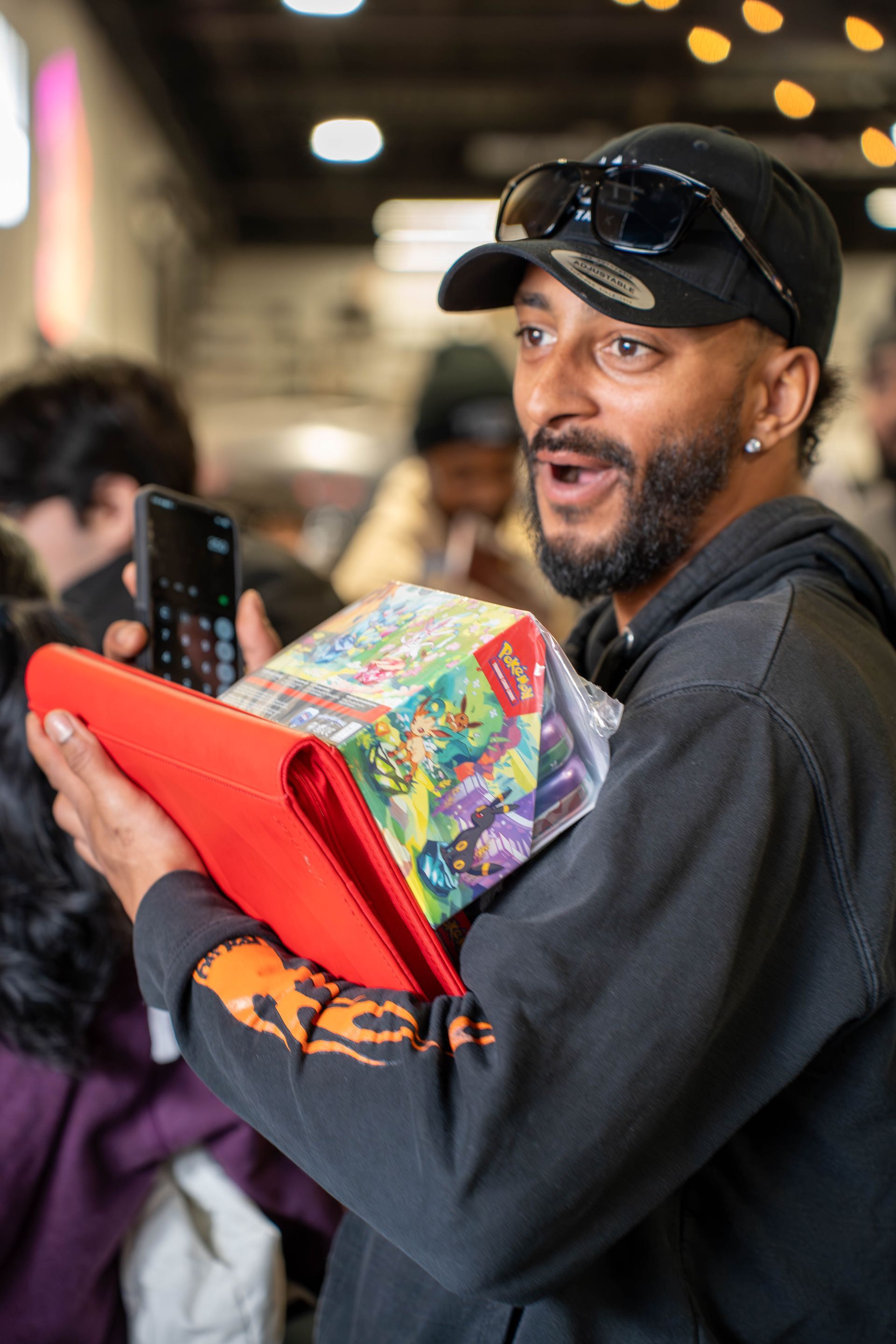 excited attendee at nextgen card show