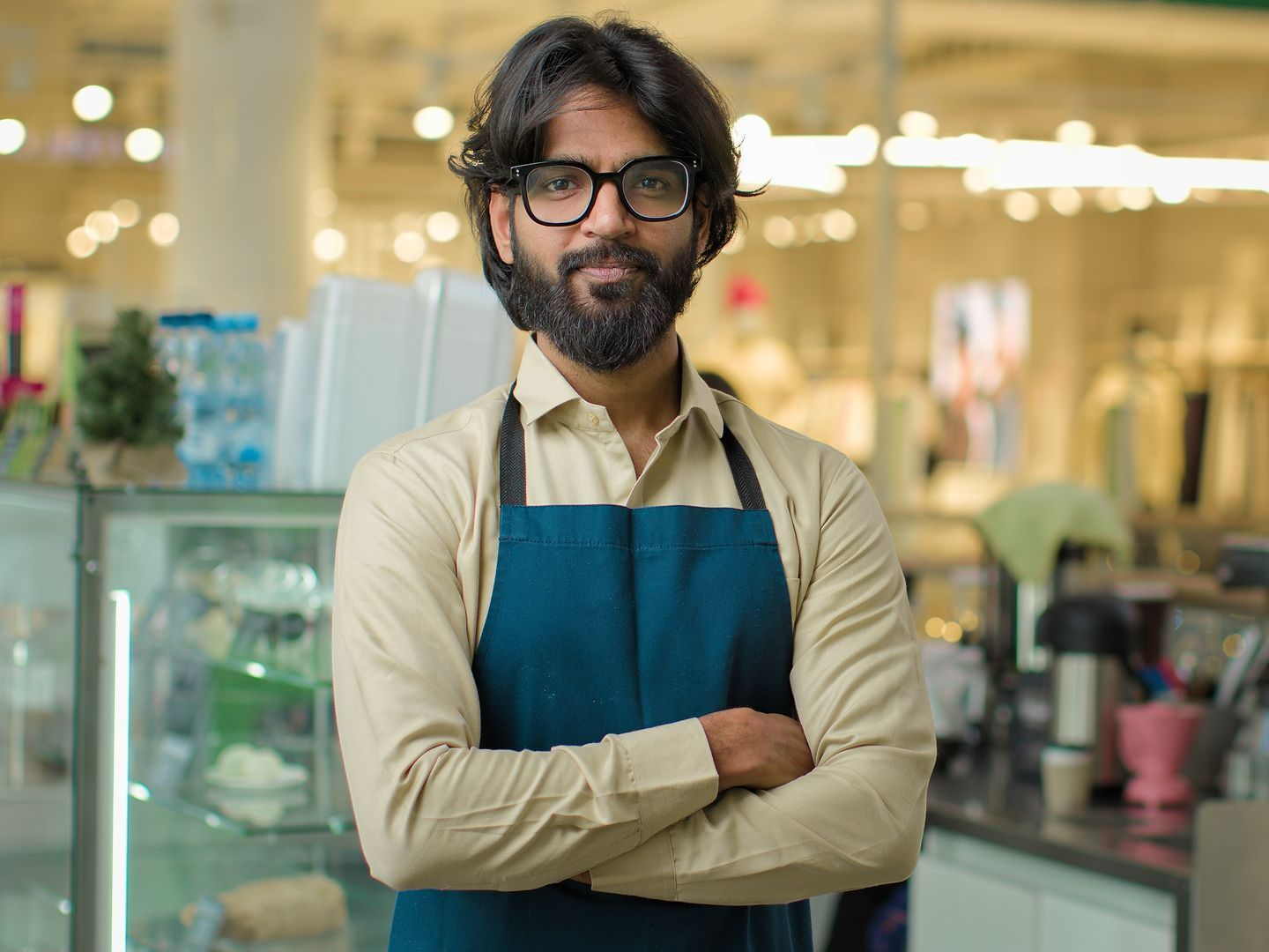 Store owner posing for a photo