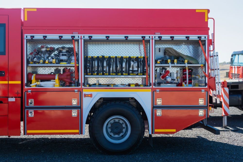 Red Fire Truck with Attached Ladder for Fast Fire Protection Services - Central West NSW