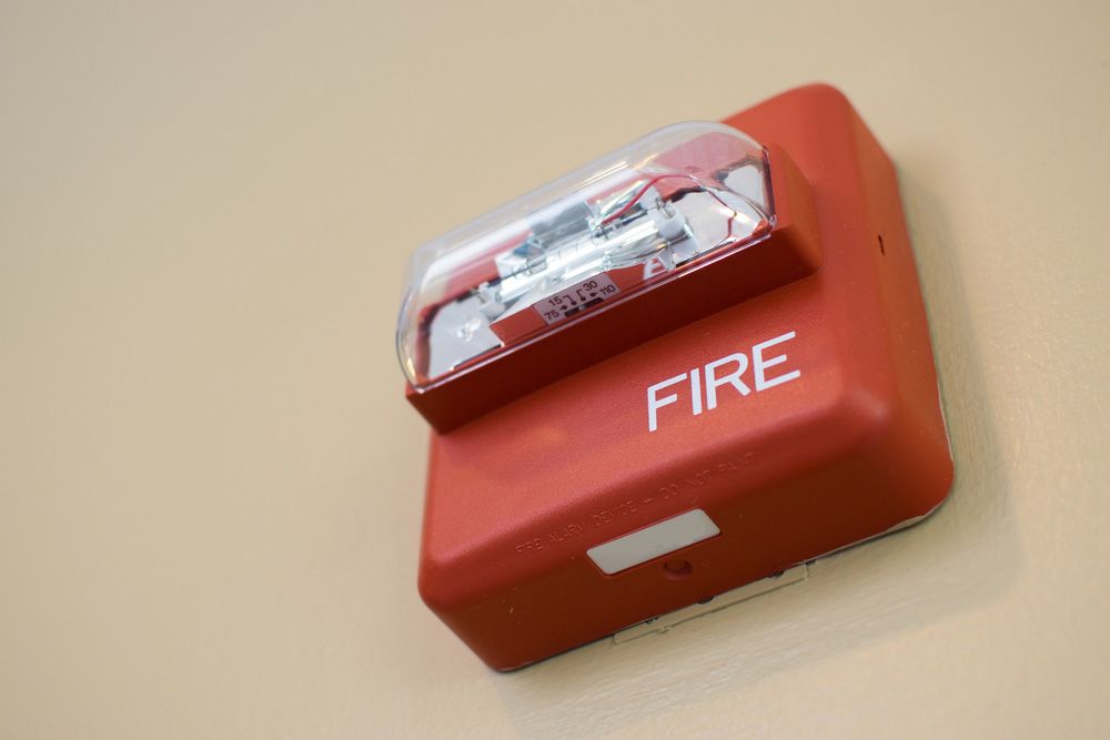 Striking Red Fire Safety Box Featuring Prominent 'Fire' Signage - Hunter Valley NSW