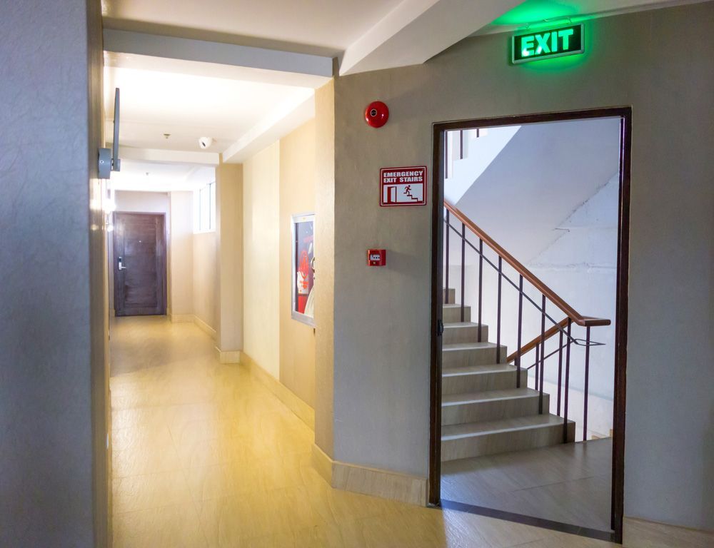 Inviting Hallway with Stairs and Illuminated Exit Sign
- Upper Hunter Valley NSW