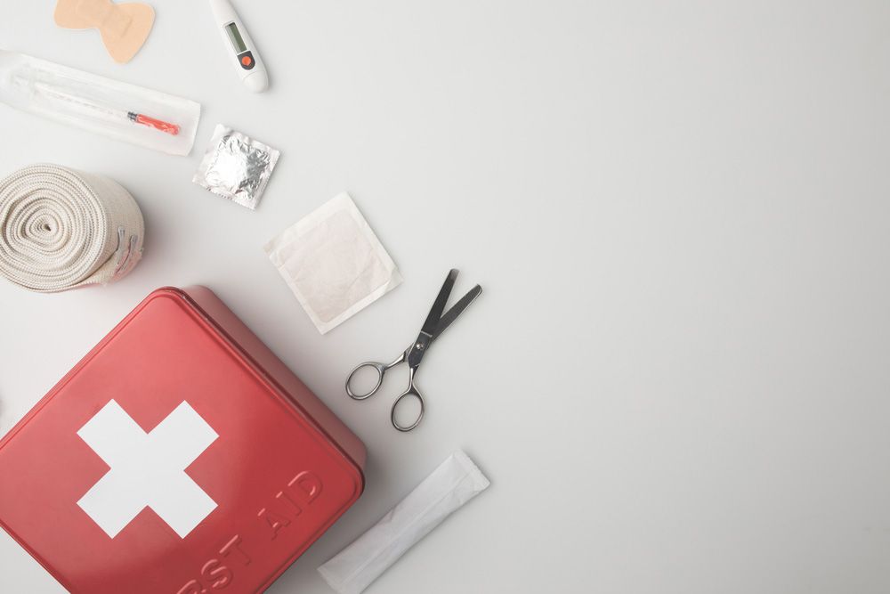 Essential First Aid Kit with Scissors, Bandages, and Thermometer for Fast Fire Protection - Upper Hunter Valley NSW