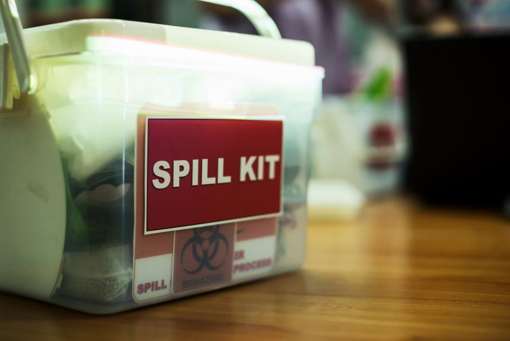 Spill Kit Rests on Timber Table - Port Stephans NSW