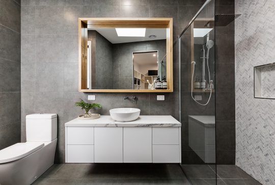 A Bathroom With A Toilet, Sink, Mirror And Walk In Shower — Pigot's Midwestern Mini Mix In Orange, NSW