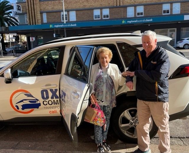 Driver Assisting Senior Woman — Medical Transport Services in Tamworth, NSW