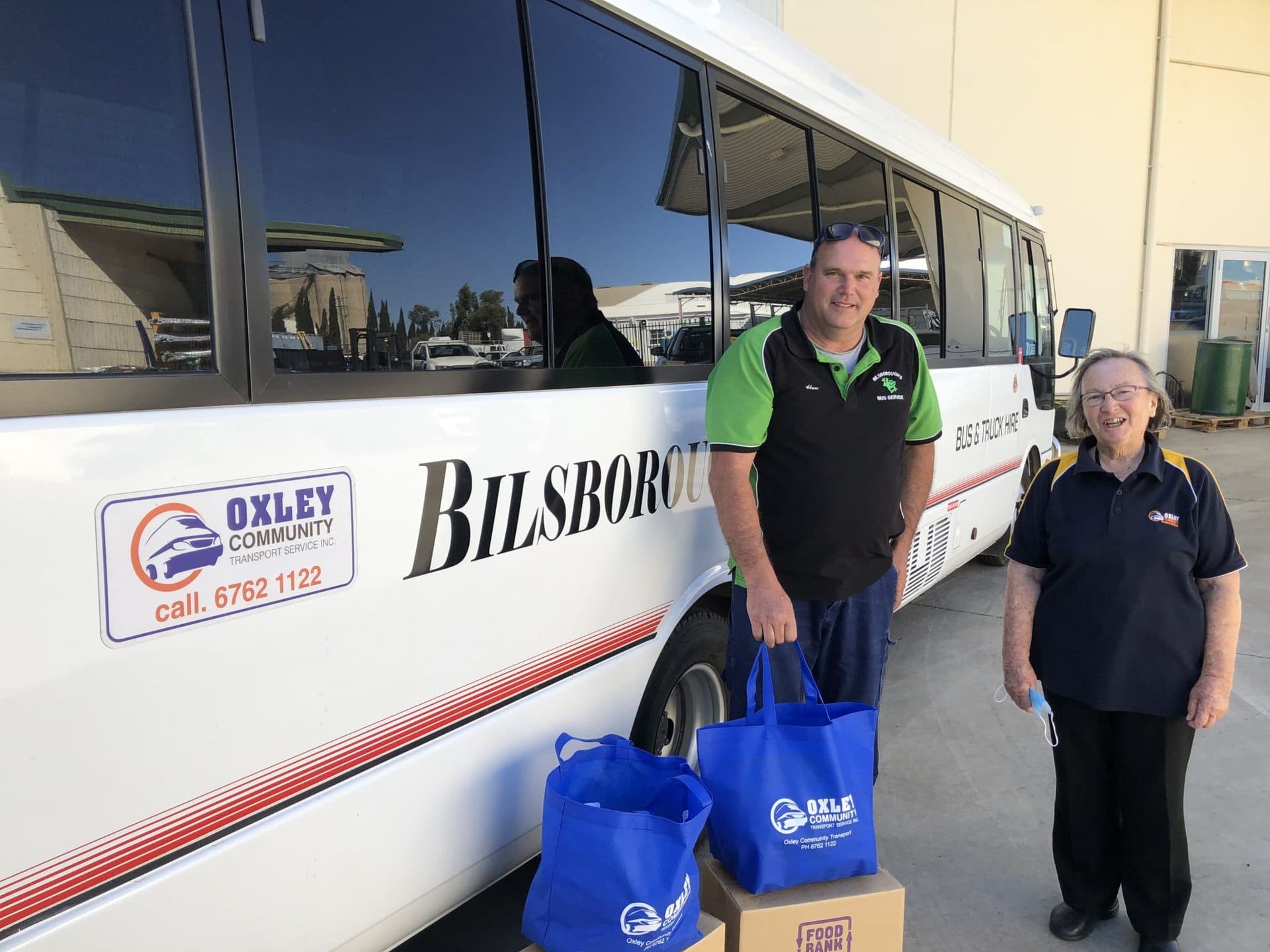 One Man And Senior Woman With The Bus Background  — Social Outings for Seniors in Tamworth, NSW