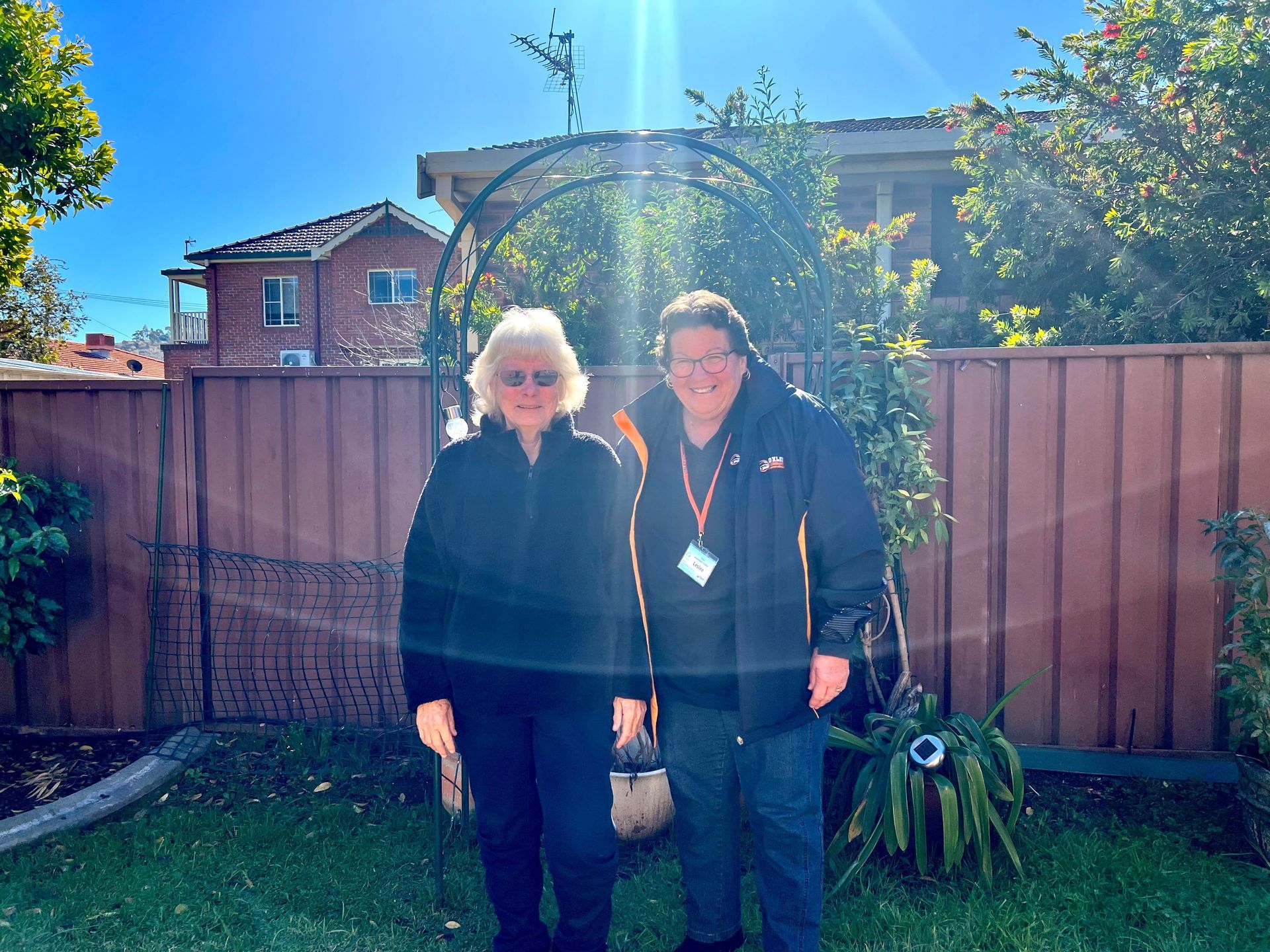 Man And Woman Volunteers Having A Conversation — Aged Care Transport in Tamworth, NSW
