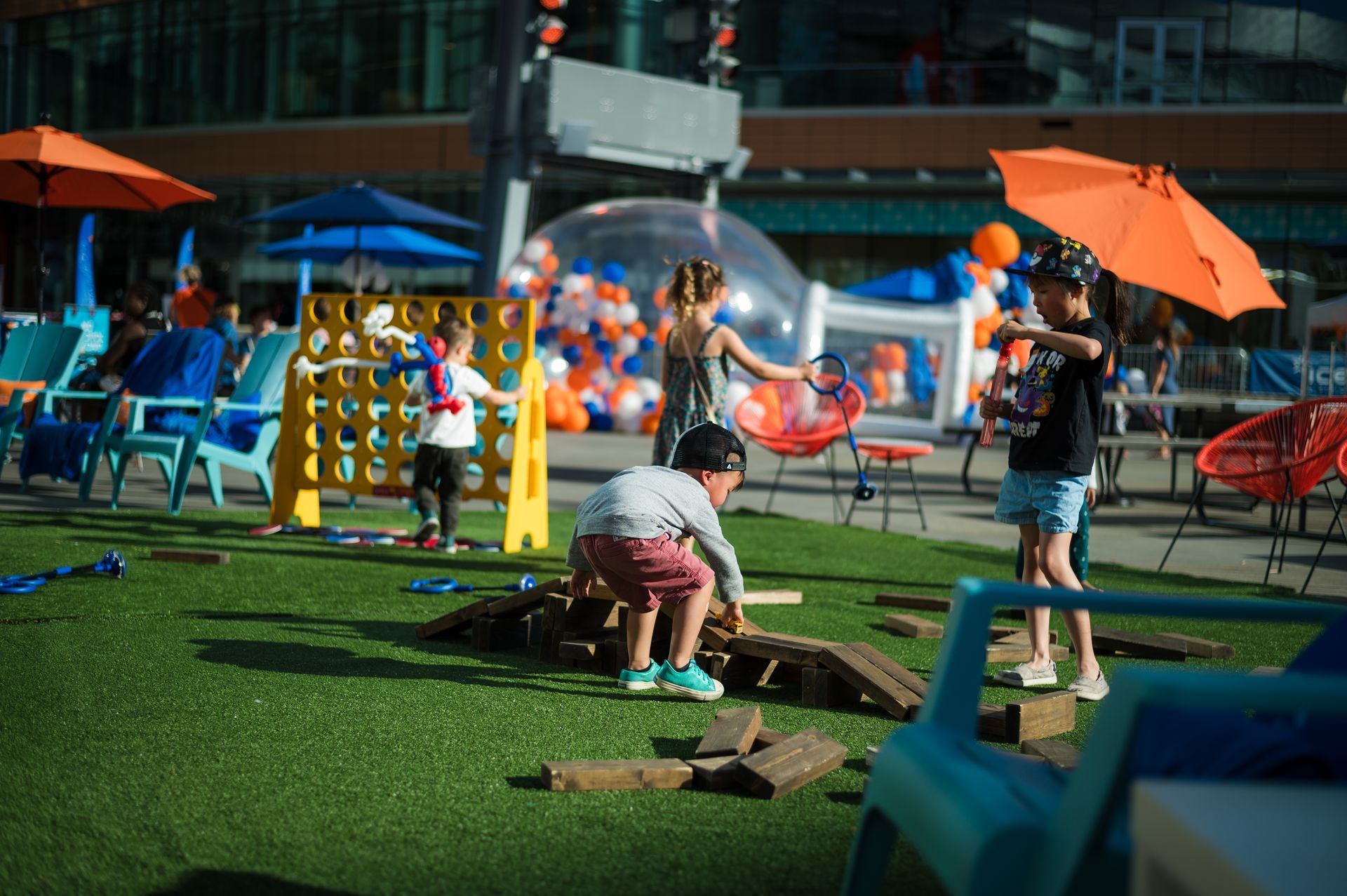 A group of children are playing in a park.