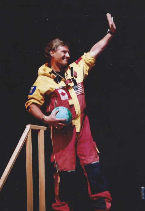 A man in a red and yellow outfit with the number 1 on it