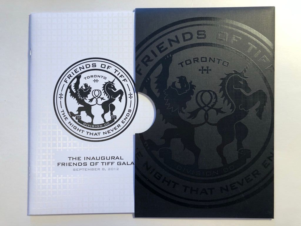 A black and white envelope that says friends on it