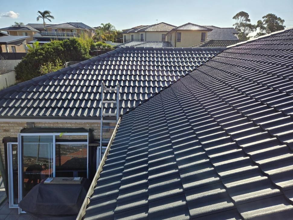 A Roof Of A House With A Lot Of Tiles On It — APEX Painting & Maintenance In Shellharbour, NSW