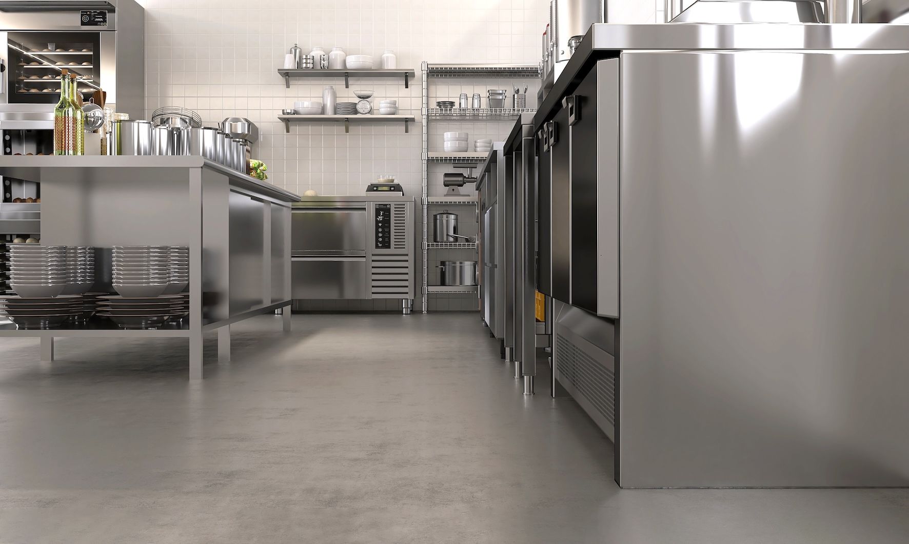 A Stainless Steel Commercial Kitchen with Equipment and Shelving — Pristine Cleaning Bundaberg In Kalkie, QLD