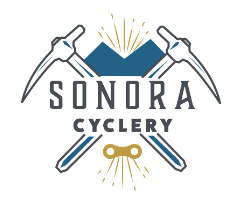 A logo for a bicycle shop called sonora cyclery.