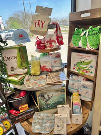 A table filled with lots of baby items and books.