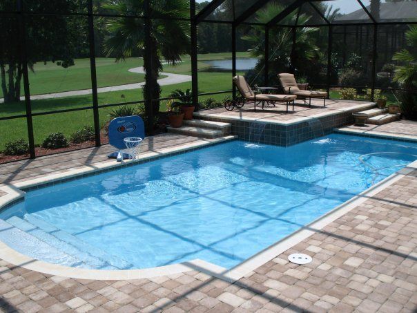 Residential pool with metal enclosure — Orange Park, FL — Stanley Pools, Inc