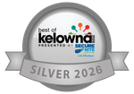 Best of Kelowna 2025 Silver award badge with grey ribbon and blue-red logo