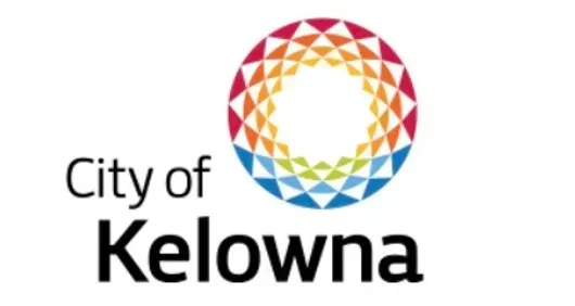 A logo for the city of kelowna with a colorful circle
