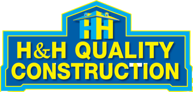 A blue sign that says h & h quality construction