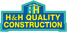 A blue sign that says h & h quality construction
