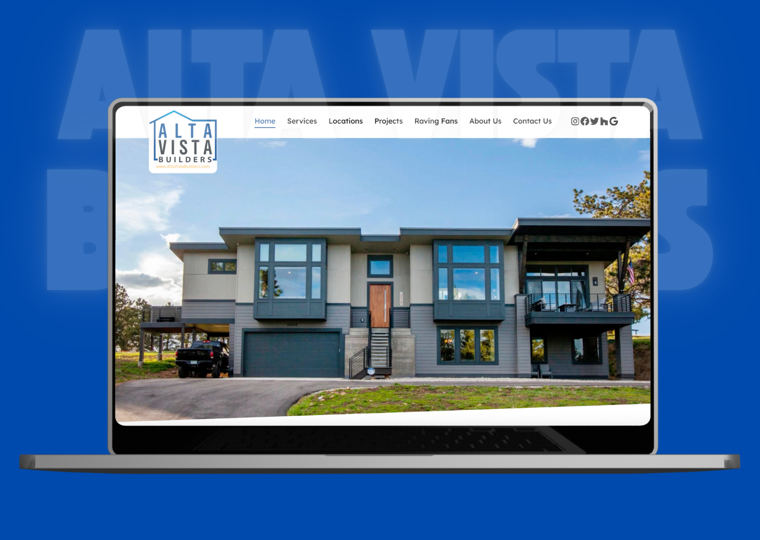 A laptop with a picture of a house on the screen.