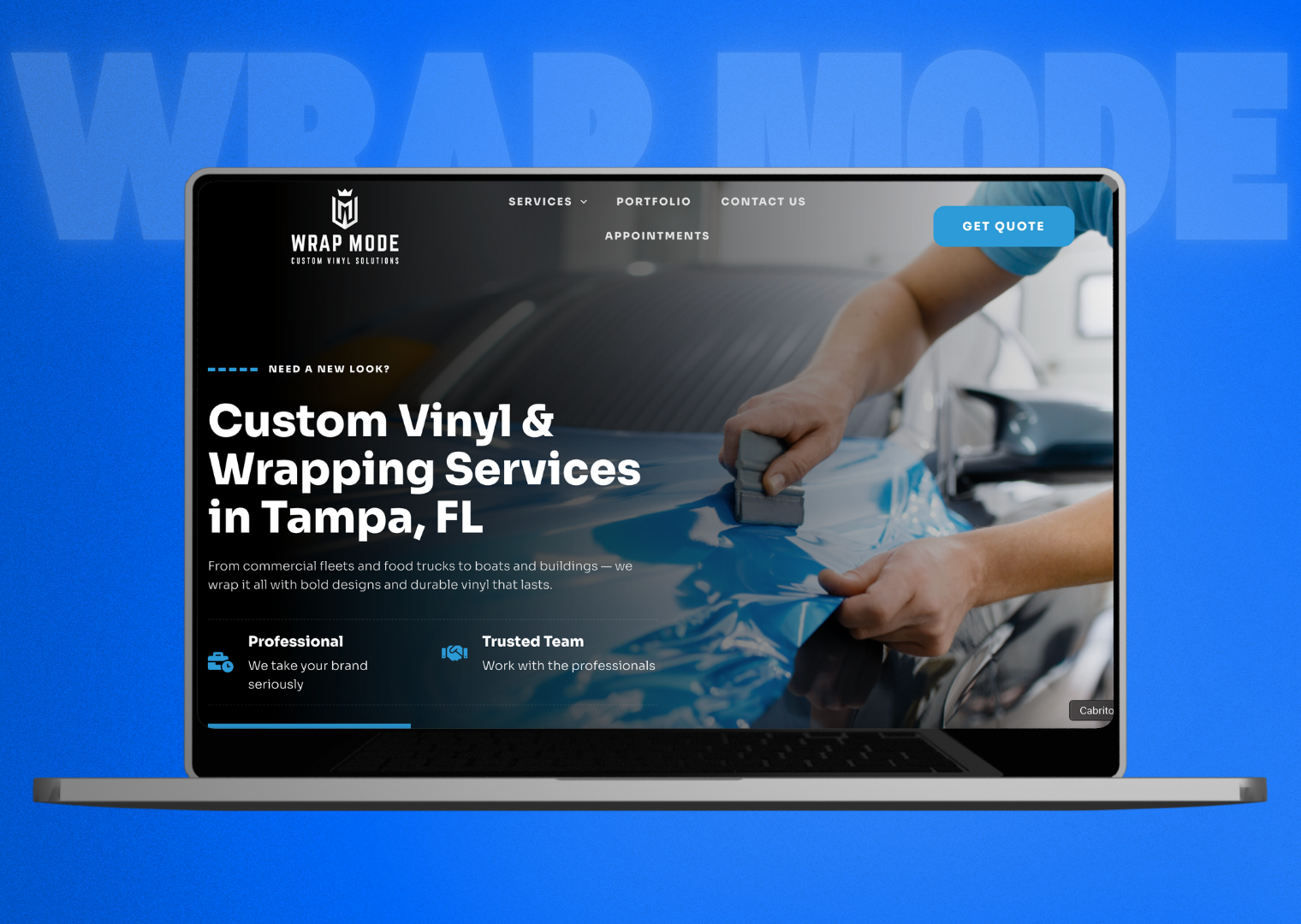 A laptop is open to a website for custom vinyl and wrapping services in tampa , fl