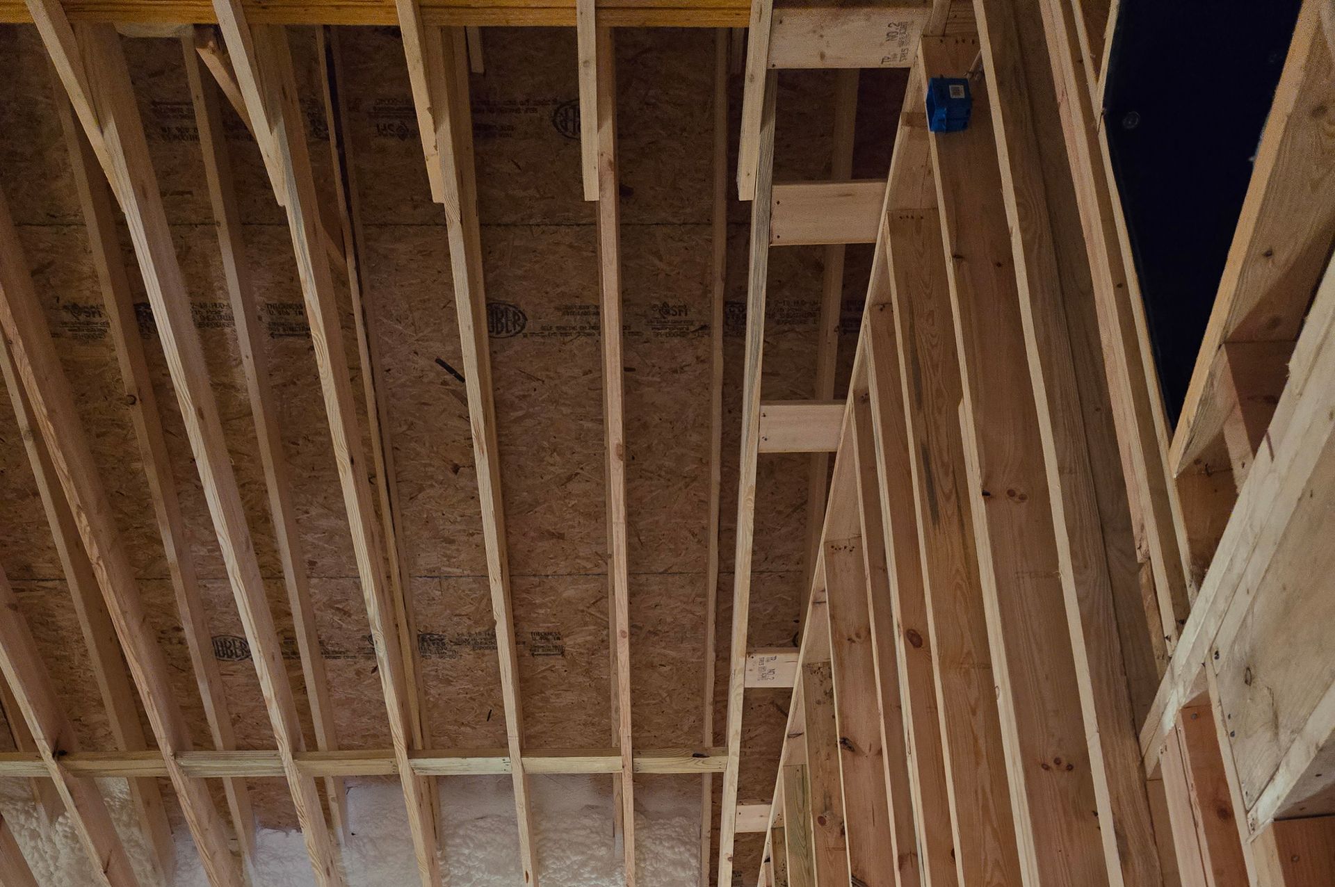 Looking up at the ceiling of a house under construction.