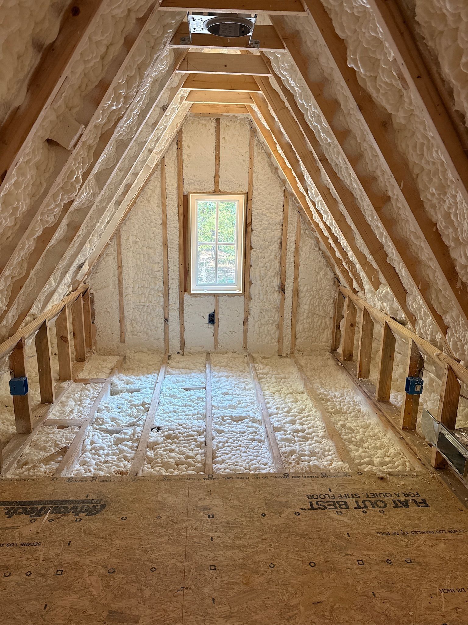 Open-cell spray foam insulation in a Chattanooga attic