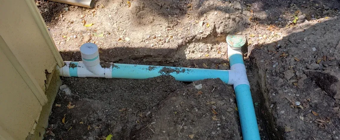 Landscape drainage solution addressing standing water and excess runoff in Lexington KY