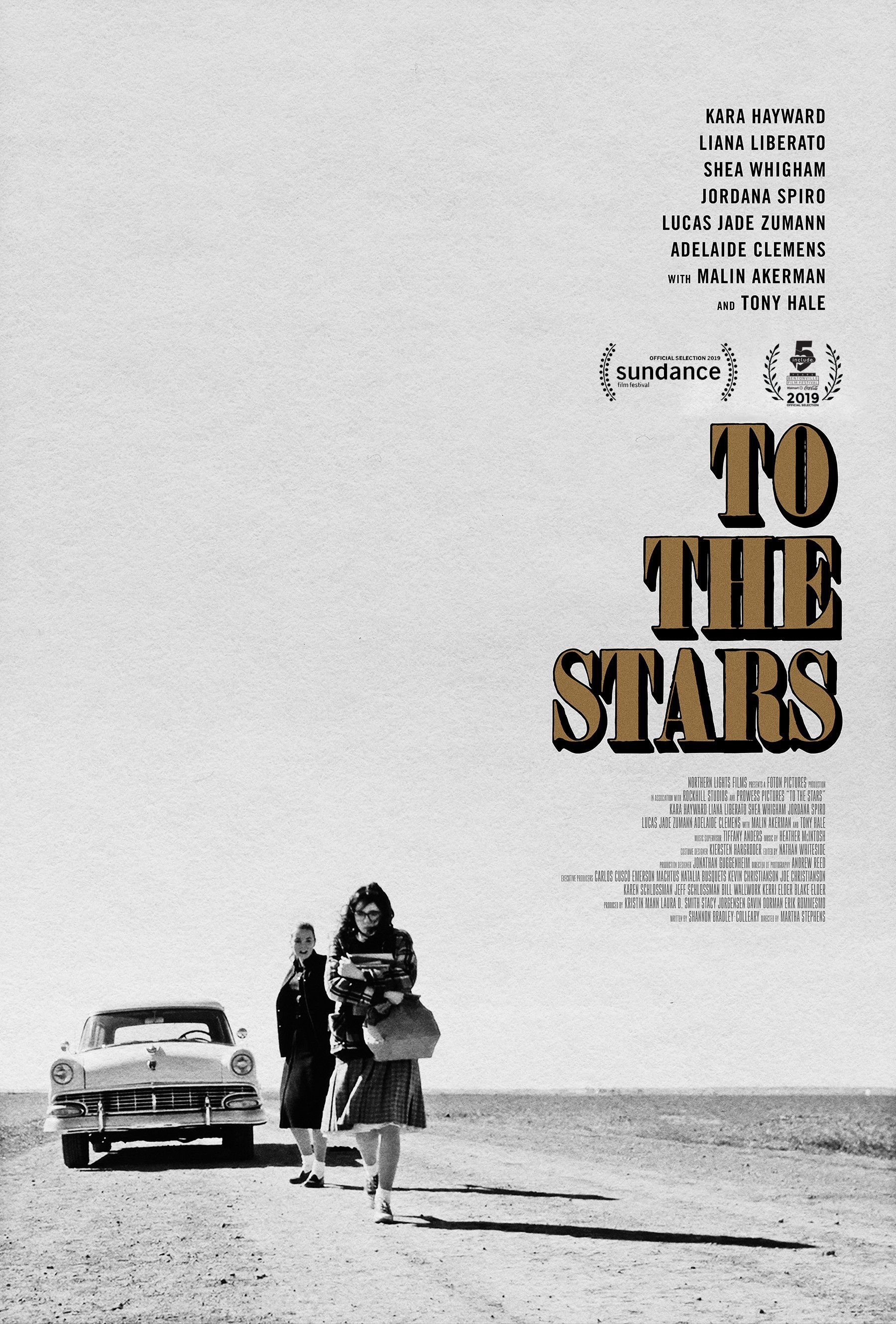 Black-and-white poster with title “TO THE STARS,” showing two people walking beside a car on a road.