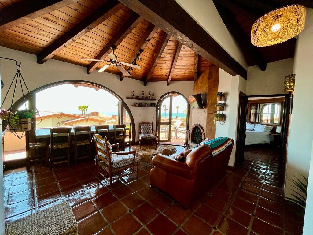 Living room and indoor outdoor dining area