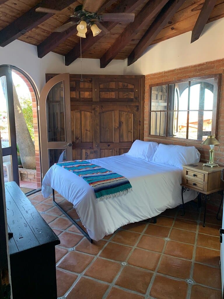 The patio suite that has a queen size bed and french doors that open to the patio at Las Gaviotas in Baja California