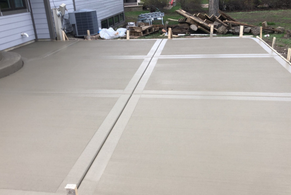 Finished concrete patio with sitting wall