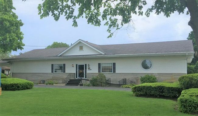 Exterior view of Wells and Cruz Family Funeral Home and Cremation Care in IN.