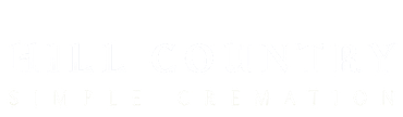 Faint white text on a pale background, barely visible and unreadable.
