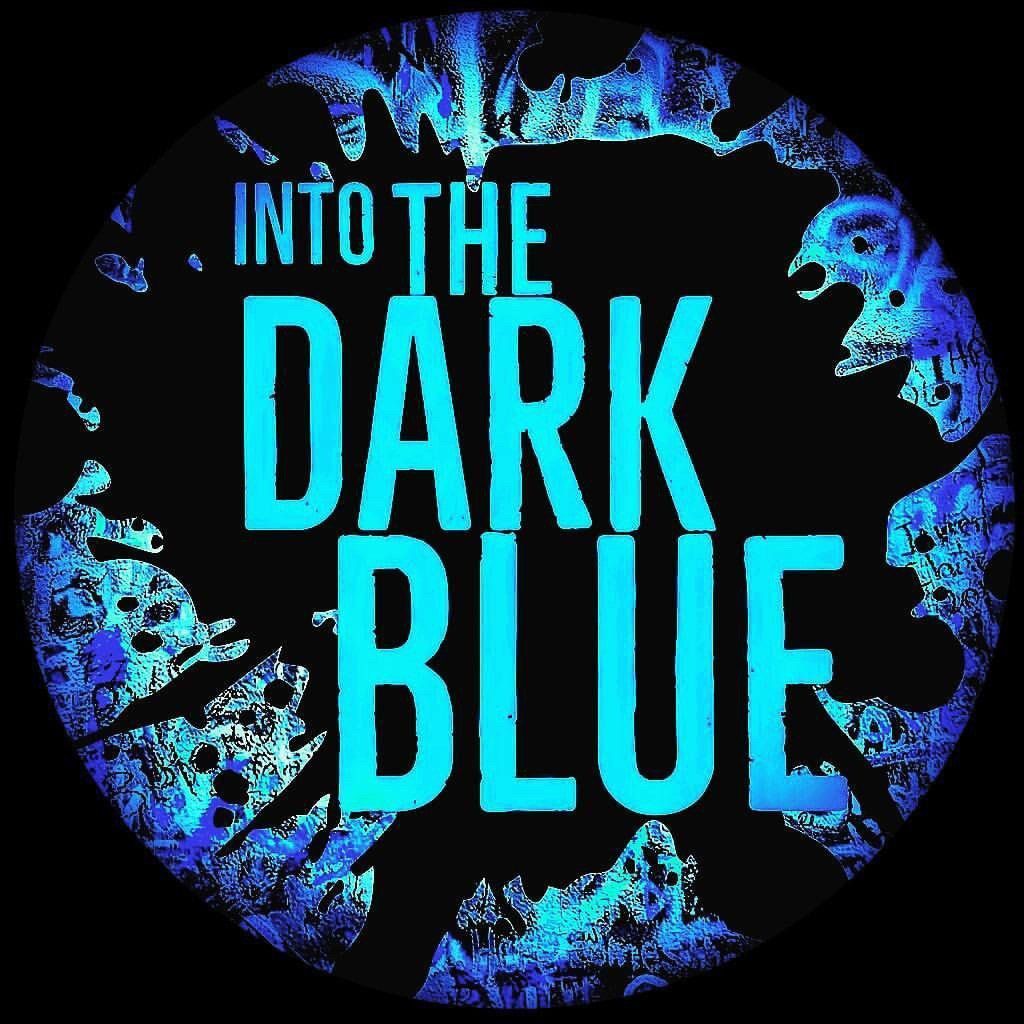 A sign that says into the dark blue on it
